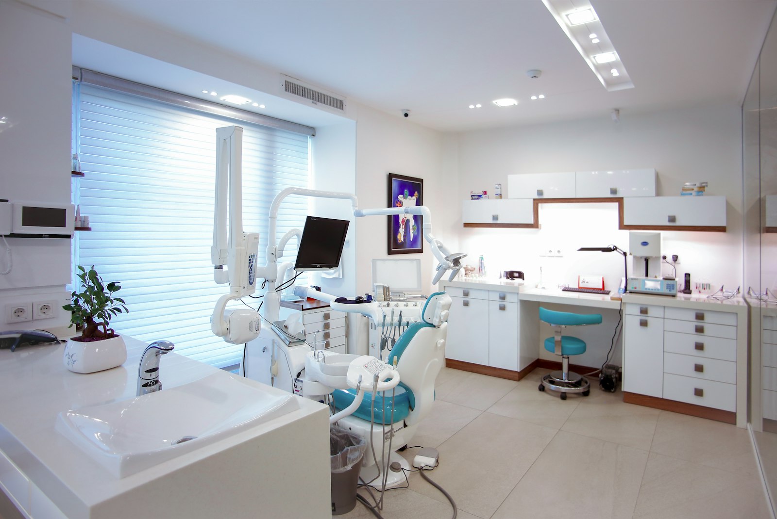Friendly dentist talking with a patient